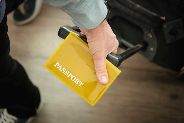 Airport Passport In Man Hand