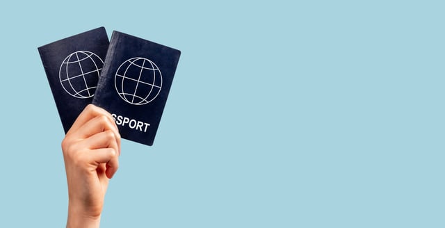 Banner With Woman Hand Showing Two Passport