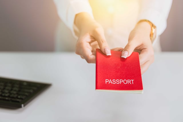 Closeup Hand Holding Passport