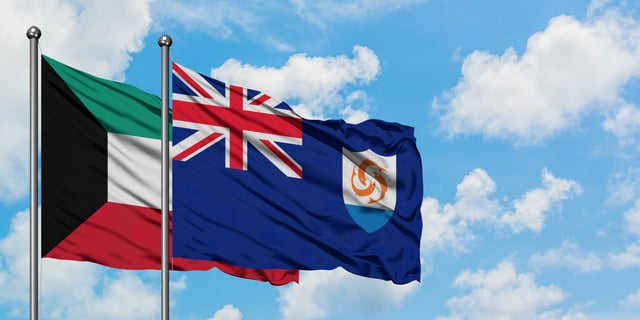 Kuwait And Anguilla Flag Waving In The Wind Against White Cloudy