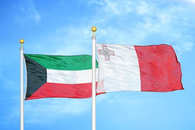 Kuwait And Malta Two Flags On Flagpoles
