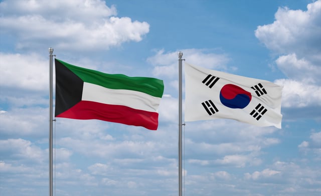 Kuwait And South Korea Flag Waving In The Wind Against White Cloudy Blue Sky Together Diplomacy