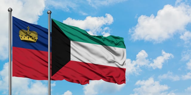 Liechtenstein And Kuwait Flag Waving In The Wind