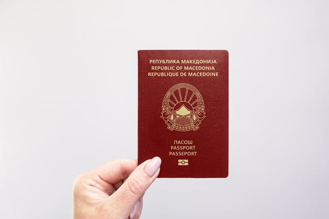 Macedonia Passport Held In Hand