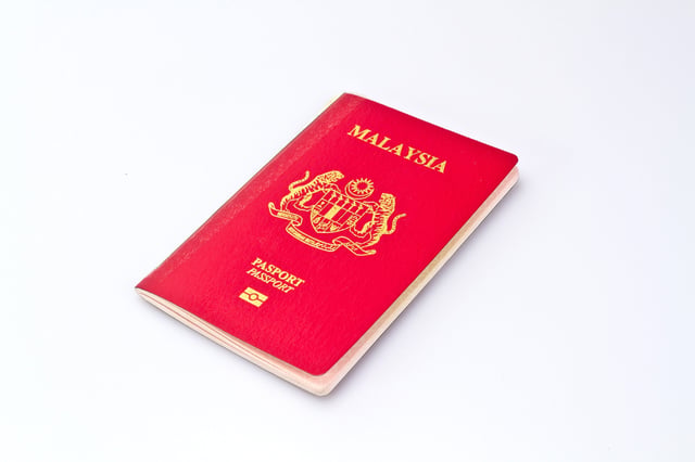 Malaysian passport on white background