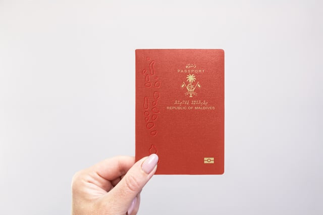 Maldives Passport Held In Hand