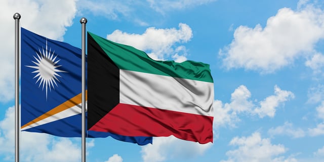Marshall Islands And Kuwait Flag Waving In The Wind