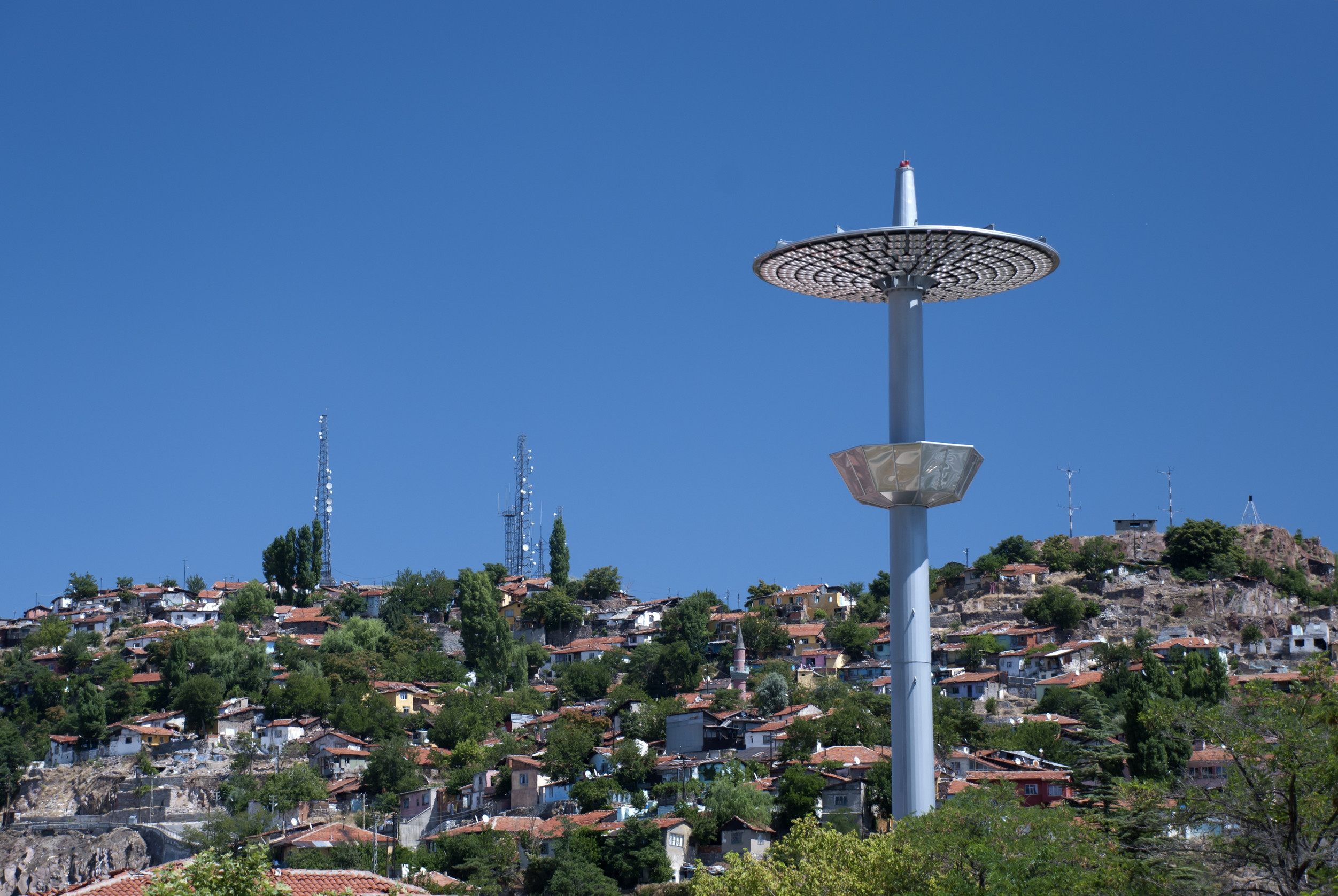 an old district view of ankara capital of turkey with lighting and mobile phone station