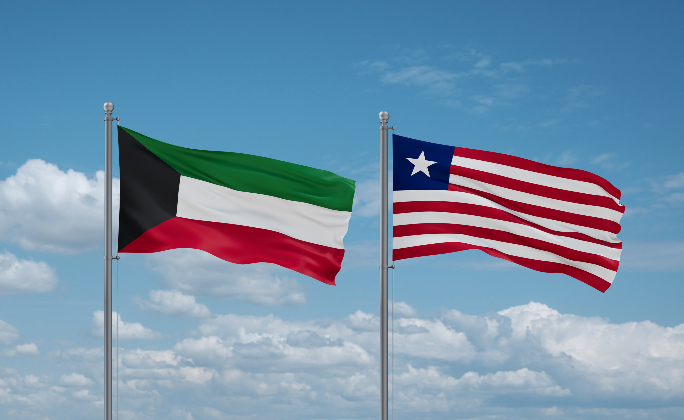 Liberia And Kuwait Flags Waving Together In The Wind