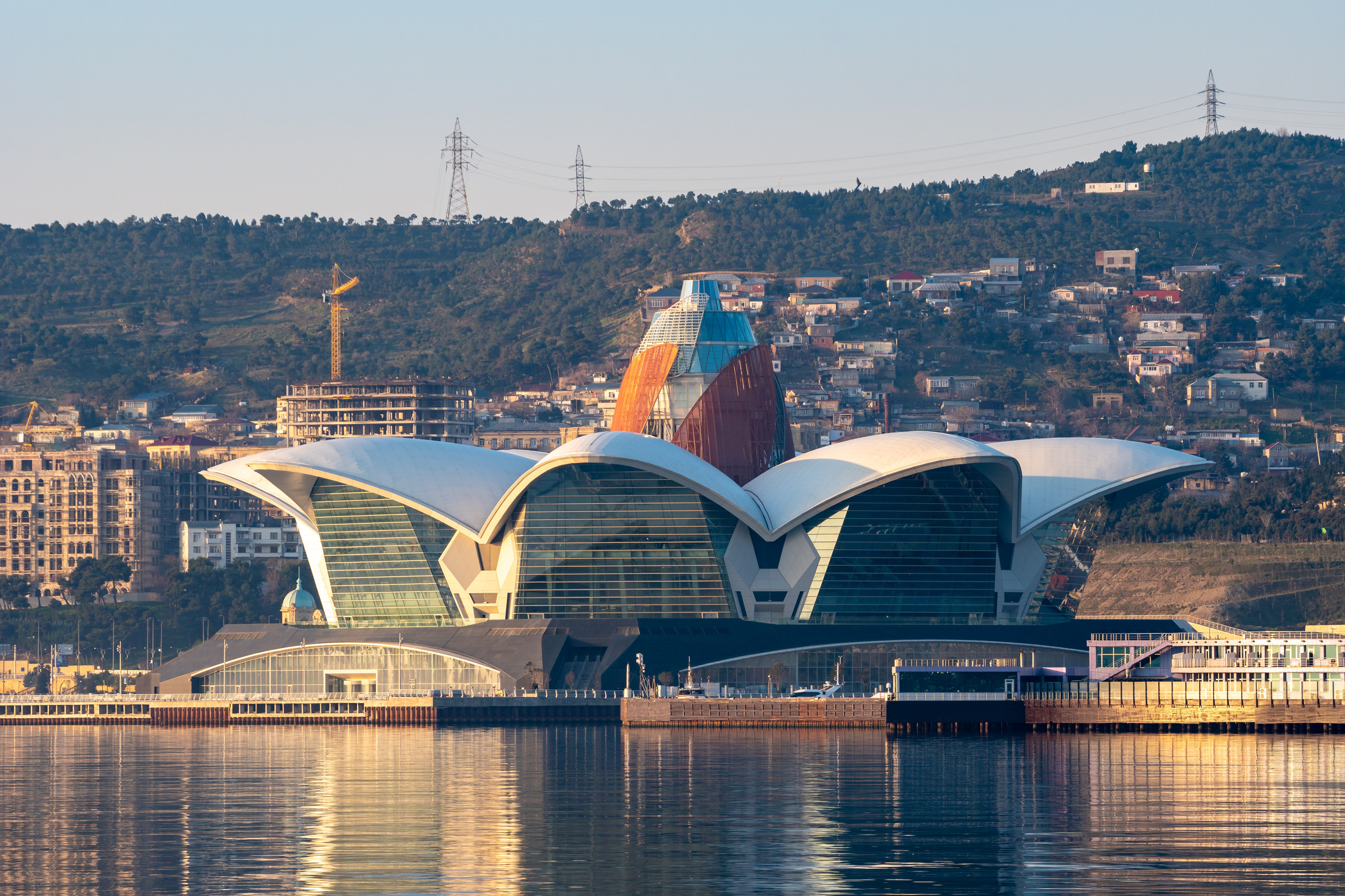 a city skyline with a large building in the middle baku azerbaijan