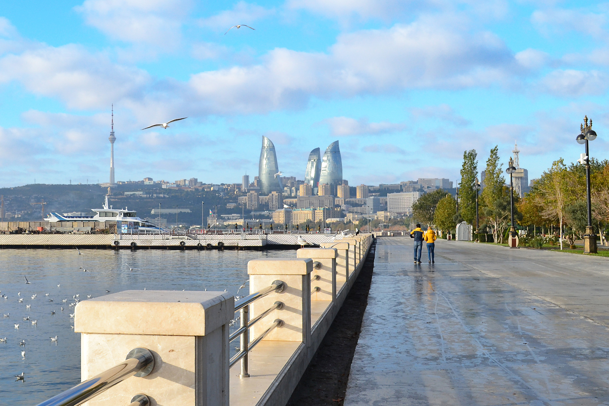 a city skyline with a large building in the middle baku azerbaijan