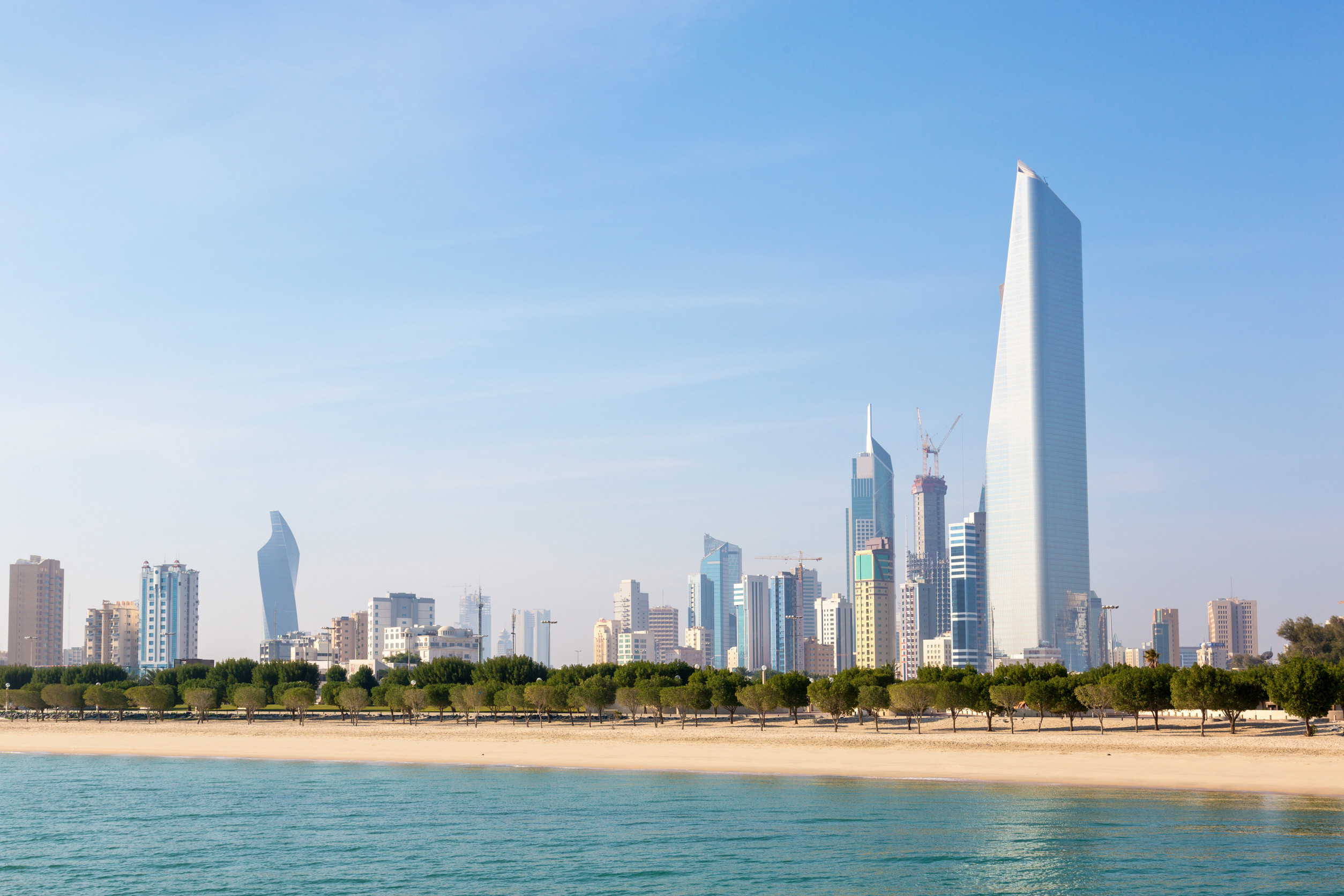 skyline of kuwait city at al shaheed park