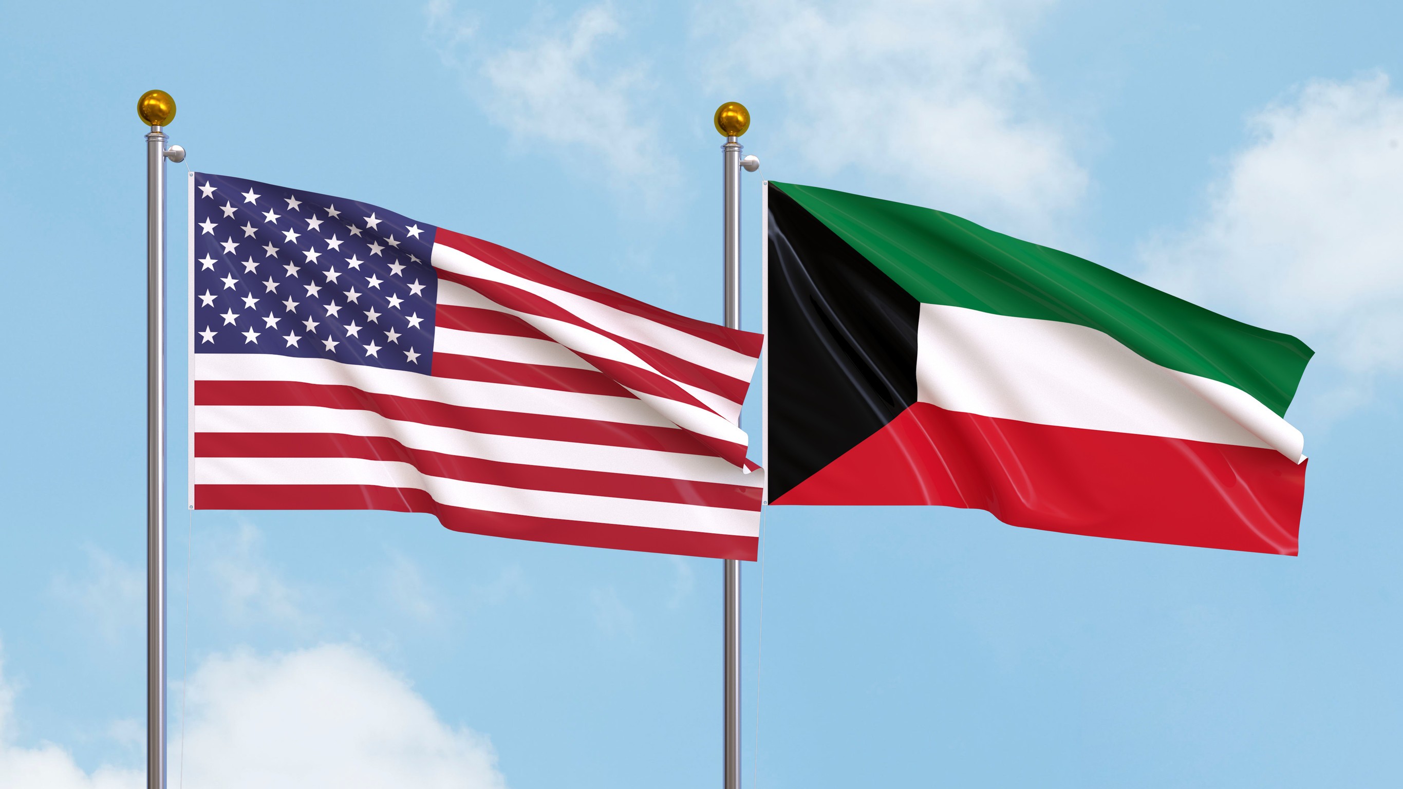 waving-flags-of-the-united-states-of-america-and-kuwait